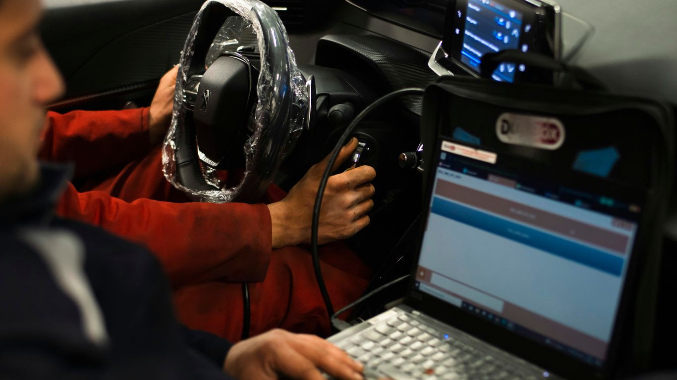 How much does it cost to get an ECU reprogrammed?